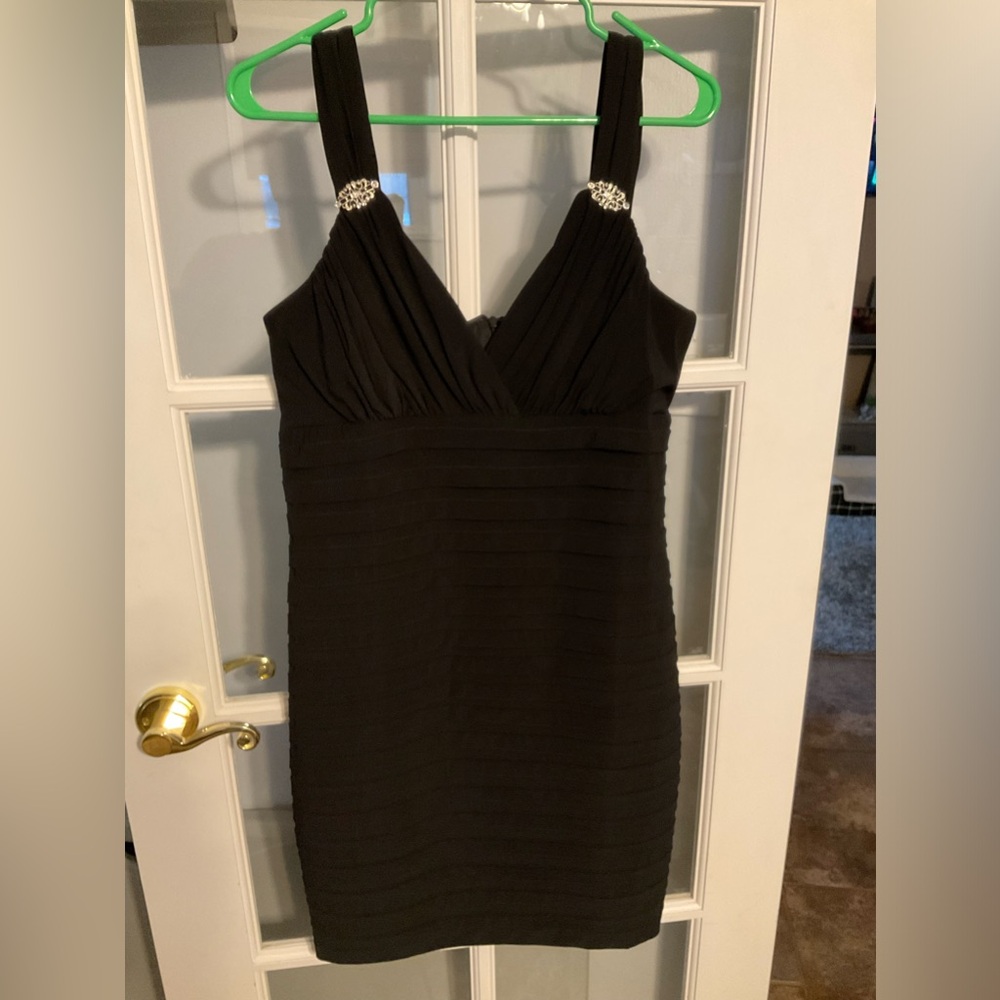 Scarlett Night Cocktail Dress. Black color in size 12 slim fitting dress